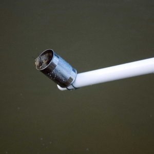 Figure 3a. Attach a can to a long pole for sampling deep areas of the pond.