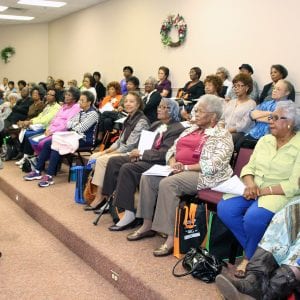 Lecture room full of older adults listening to a SAI presentation