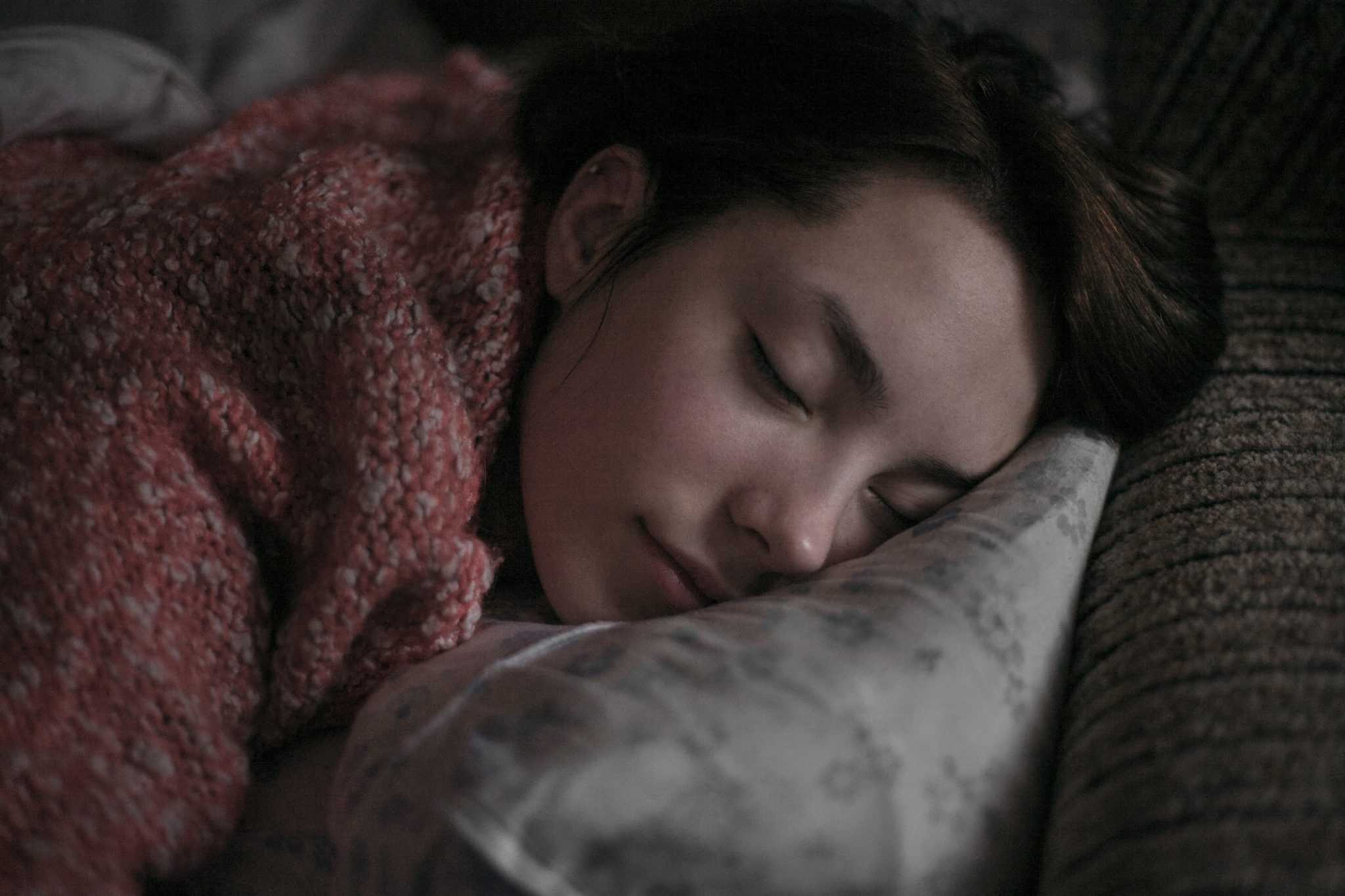 Woman sleeping on pillow