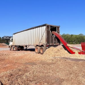 Figure 3. A chip van collecting wood chips for transportation.