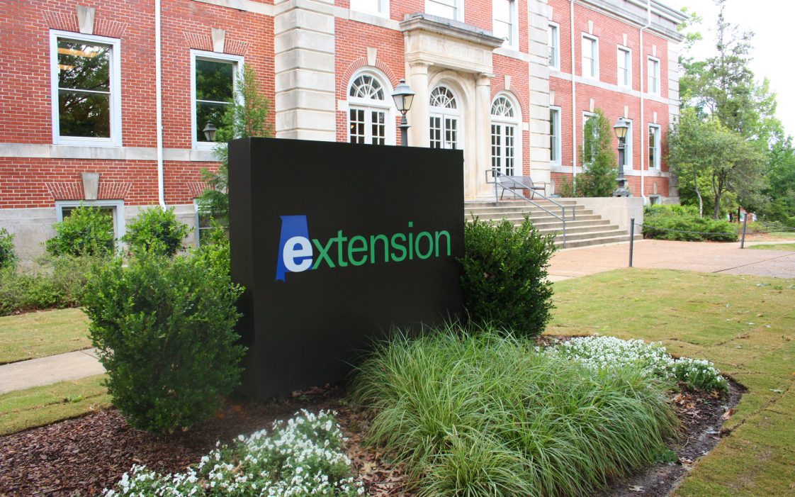 The Extension sign outside Duncan Hall on Auburn's campus.