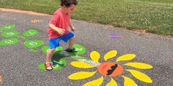 Child playing on sensory paths.