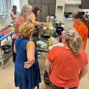 Food safety agent teaching a canning class in Limestone County