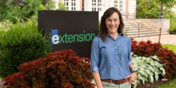 Eve Brantley standing in front of Duncan Hall.