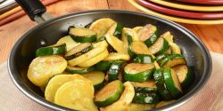 Sautéed summer and zucchini squash in a frying pan